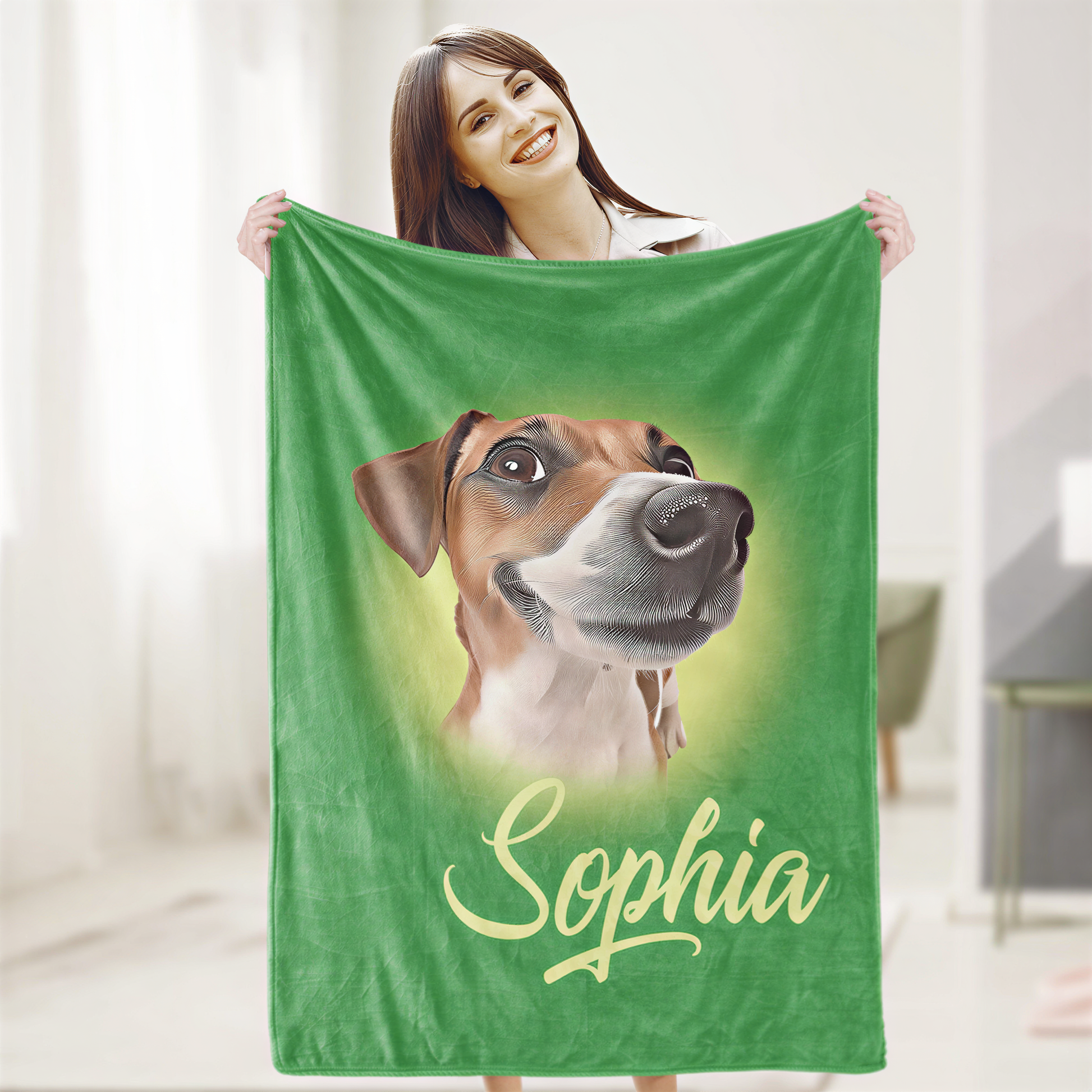 A woman is holding a green blanket with a picture of a dog on it, and the name "Sophia" is written below the image.